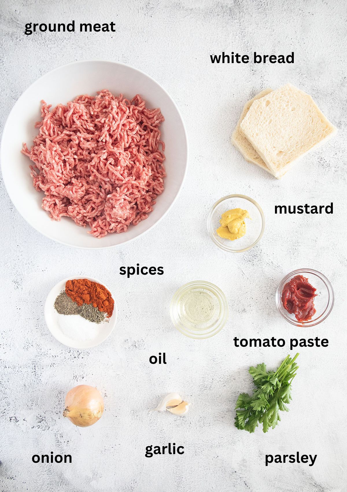 labeled ingredients for making meatballs without eggs with white bread, spices, parsley and mustard.