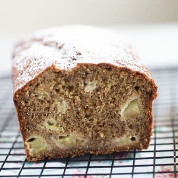 rhubarb and banana bread showing the rhubarb pieces inside the tender crumb.