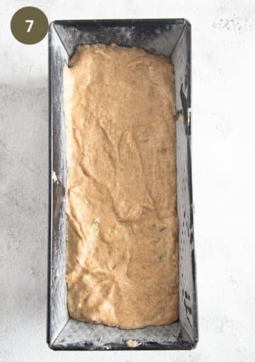 banana rhubarb bread batter in a prepared loaf tin before baking.