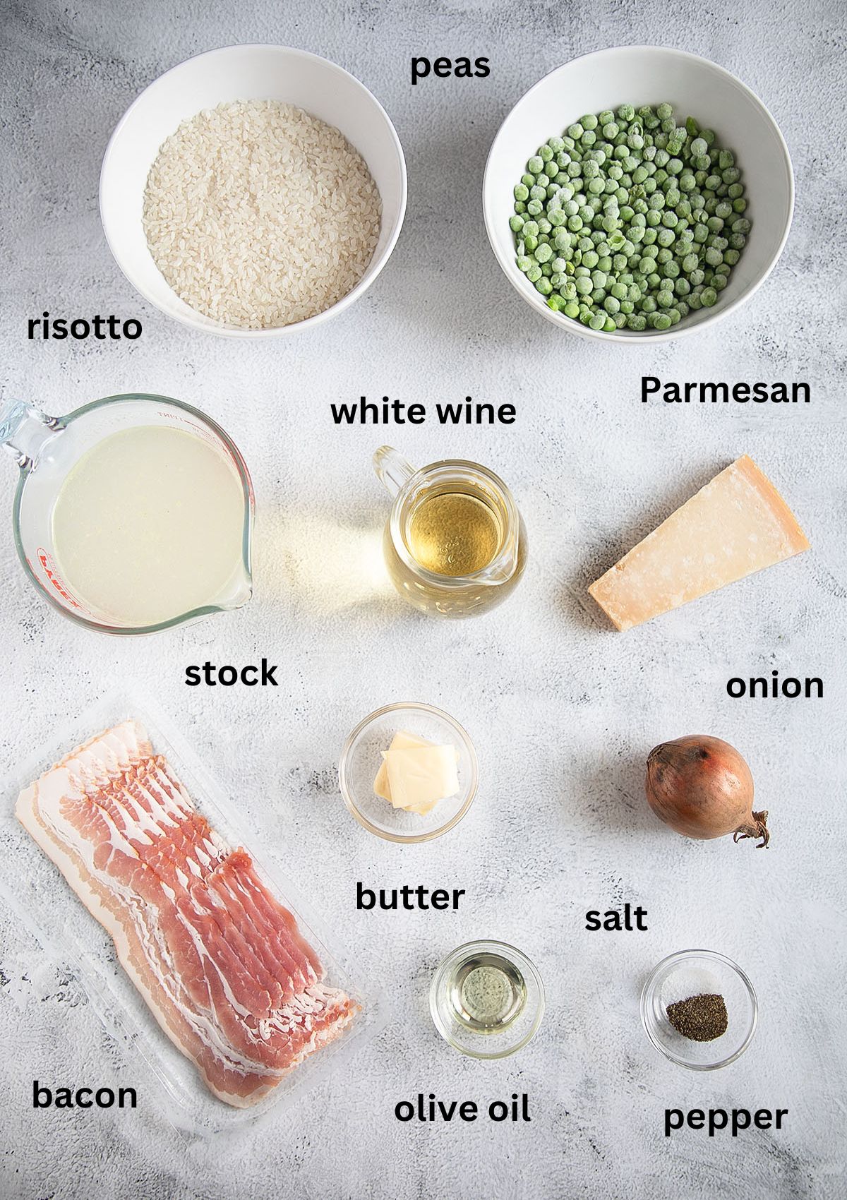 labeled ingredients for making risotto with bacon, peas, parmesan and stock.