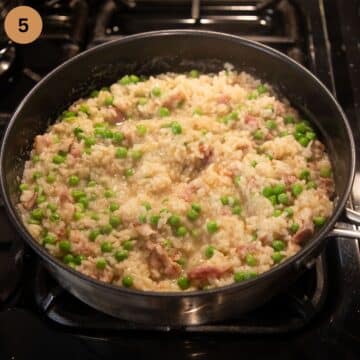 adding frozen peas to risotto with bacon in a large saucepan.