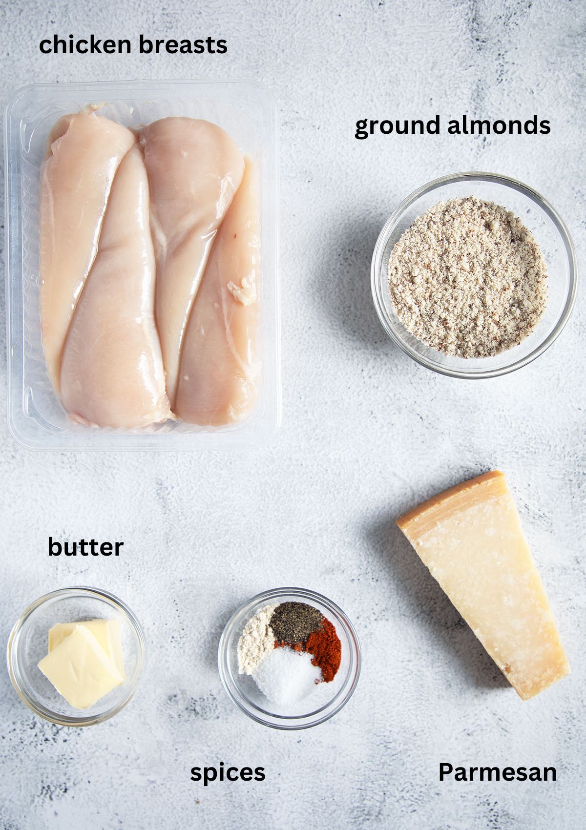 labeled ingredients for baking chicken breasts with almond and parmesan crust.