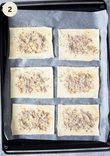 six unbaked pieces of pastry sprinkled with ground almonds.