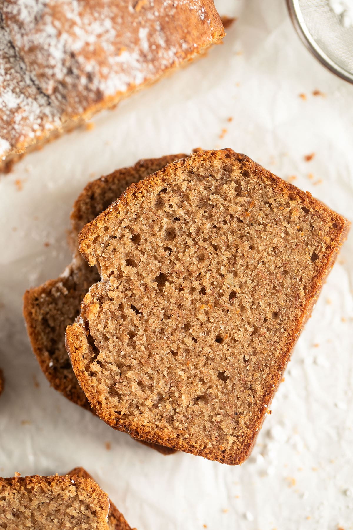 slices of vegan banana bread with spelt flour in the table.