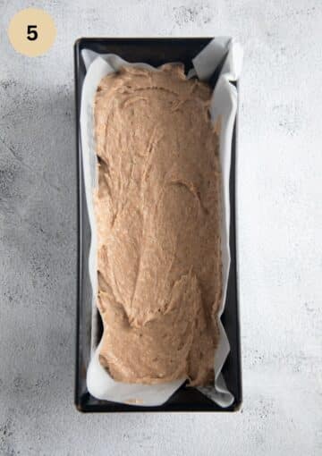 unbaked banana bread batter in a loaf pan.