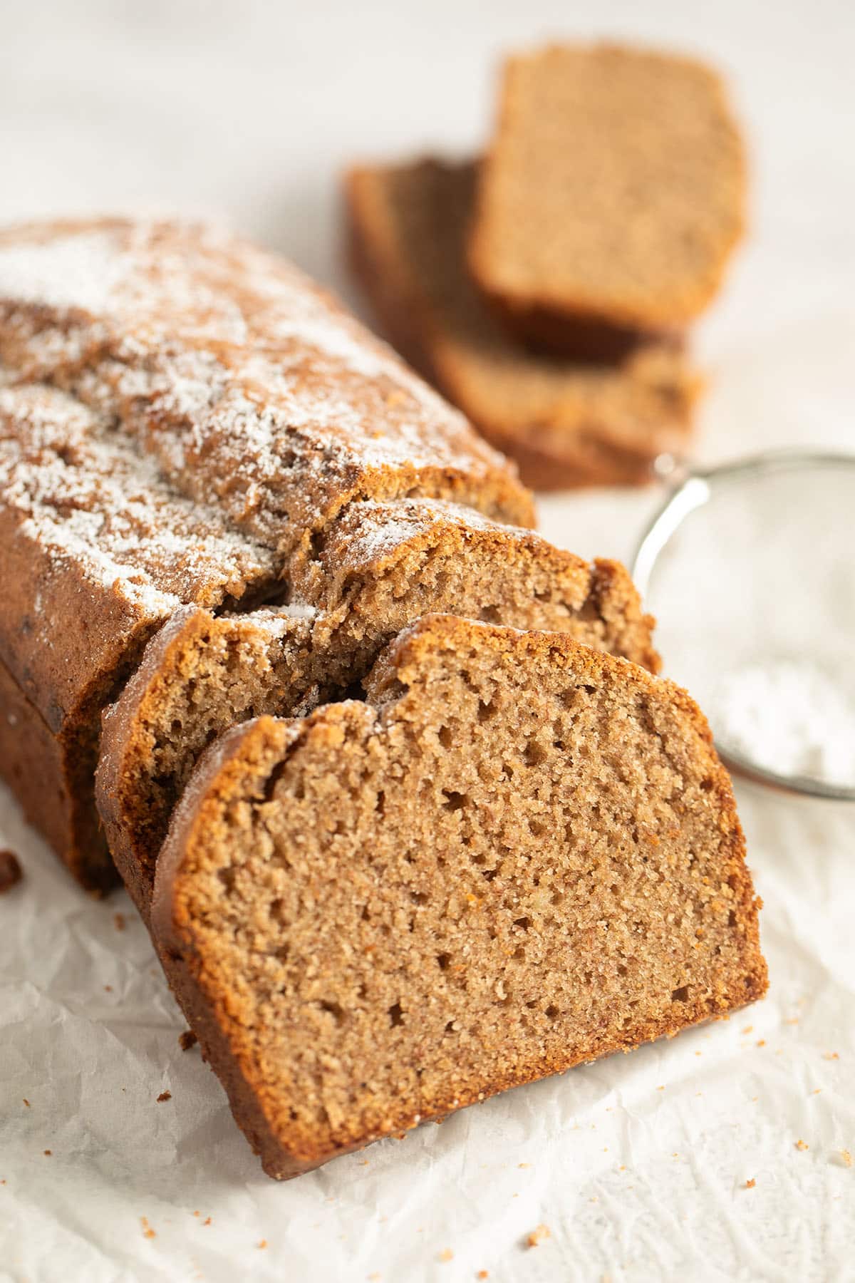 sliced spelt banana bread on the table.