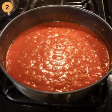 cooking tomato sauce in a saucepan.