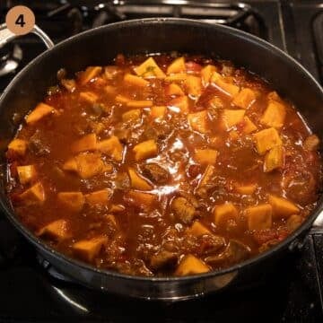 sweet potato cubes and pork pieces simmering in a rich gravy to make stew.