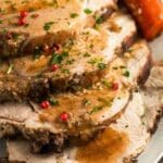 pin image with the title dutch oven pork roast.