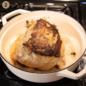 searing a pork roast in a large dutch oven.