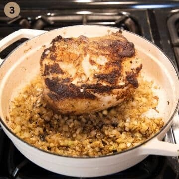 searing roast and onions in a dutch oven.