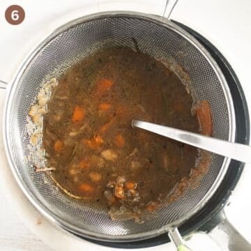 passing cooked vegetables through a sieve to make gravy.