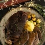 pinterest image with the title tender venison roast.