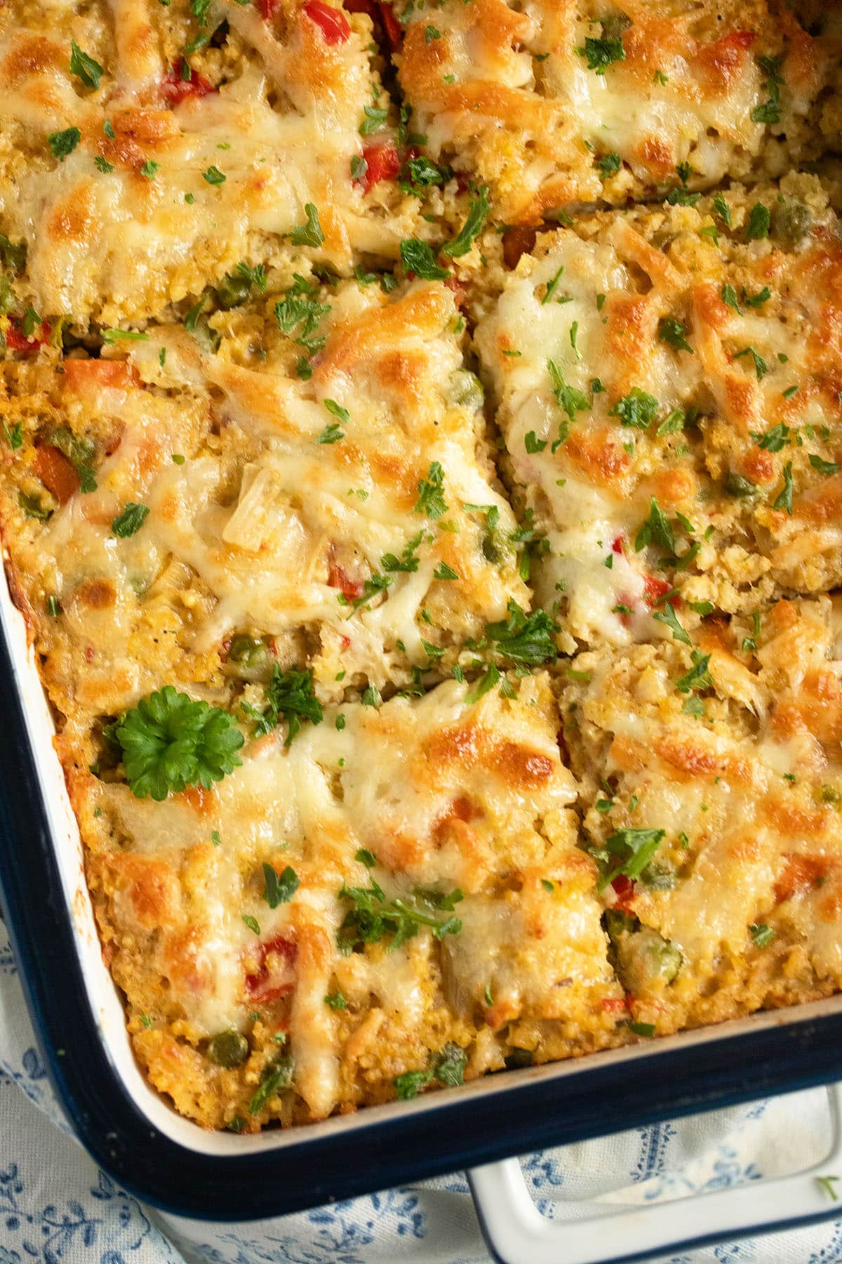 baked millet with vegetables in a baking dish.