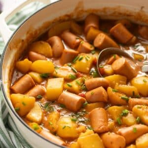 sausage goulash with potatoes in a large dutch oven.