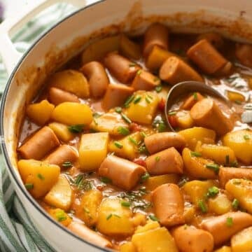 sausage goulash with potatoes in a large dutch oven.