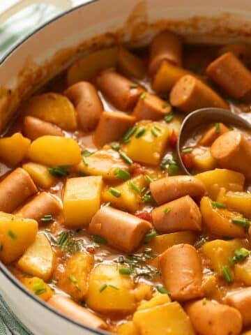 sausage goulash with potatoes in a large dutch oven.