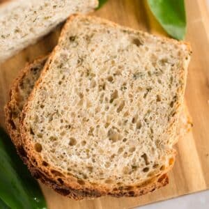 chive bread slices on a cutting board.