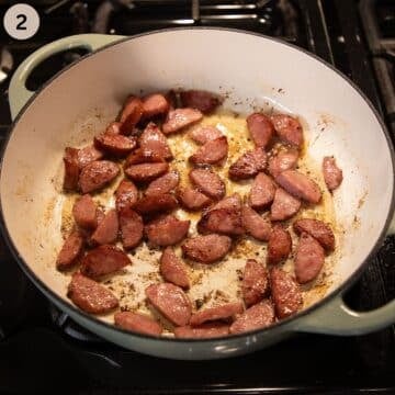 frying chopped kielbasa in a large pot.