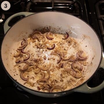 cooking onion slices in a large dutch oven.