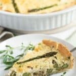 pinterest image with the title asparagus and salmon quiche.