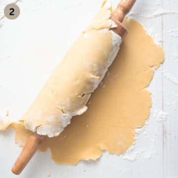 rolled shortcrust wrapped over a rolling pin.