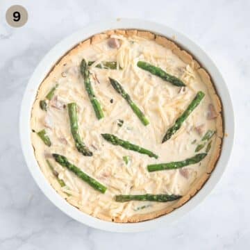 assembled but unbaked quiche in a baking dish.