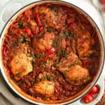 chicken orzo bake in a round dutch oven.
