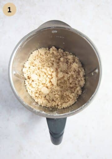 crumbly dough for making empanadas before adding the eggs in a food processor.