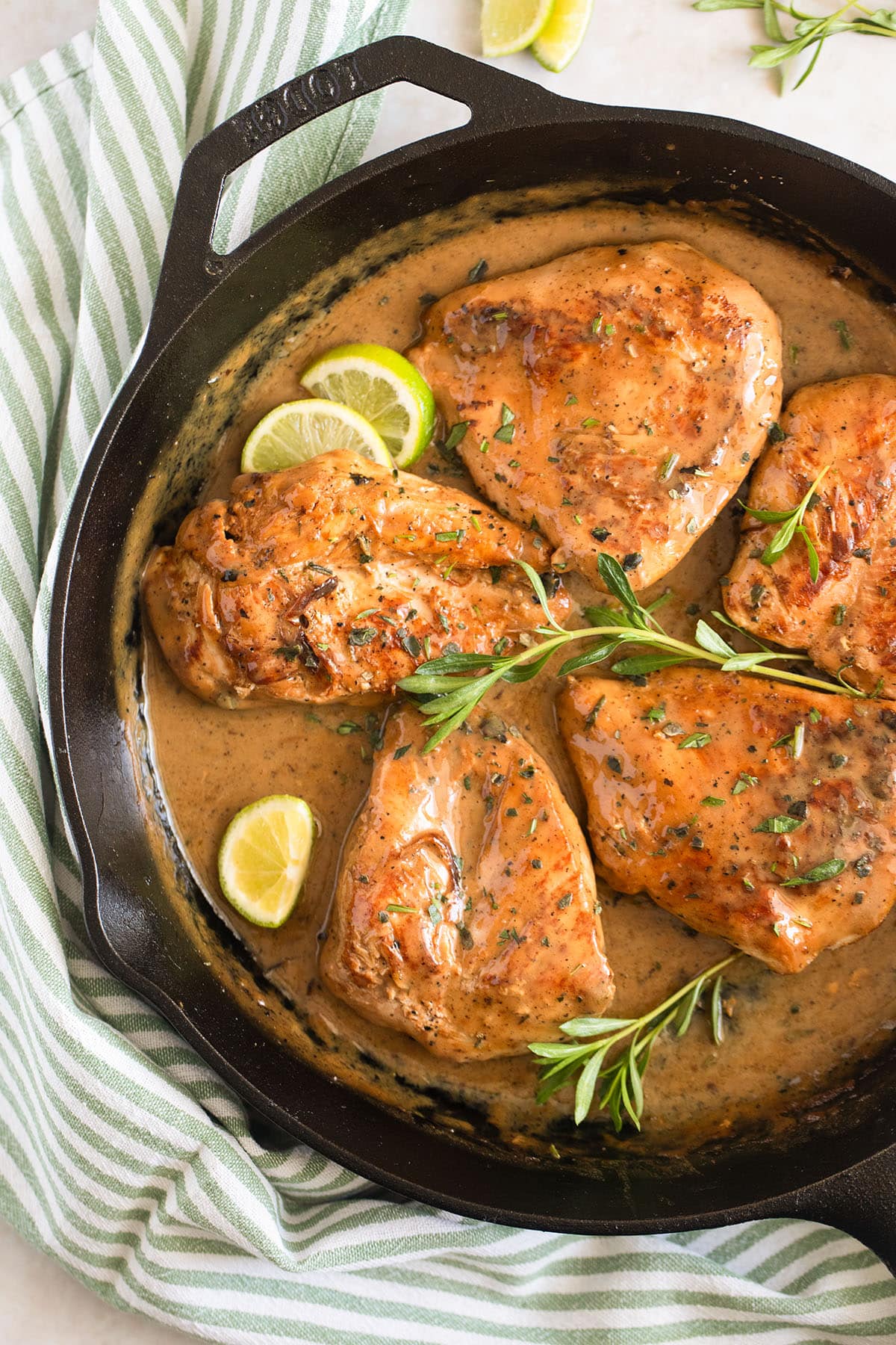 chardonnay chicken breasts and sauce in a skillet.