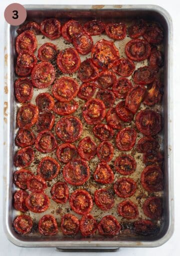 slow baked tomatoes in a baking pan.