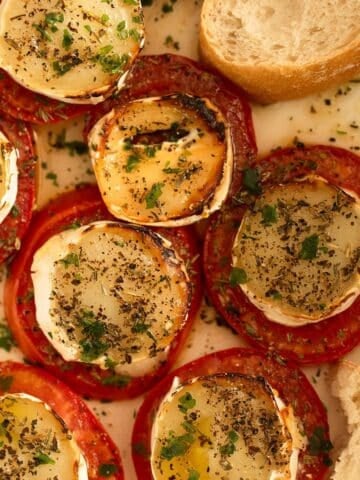 baked goat cheese with tomatoes, honey and herbs.