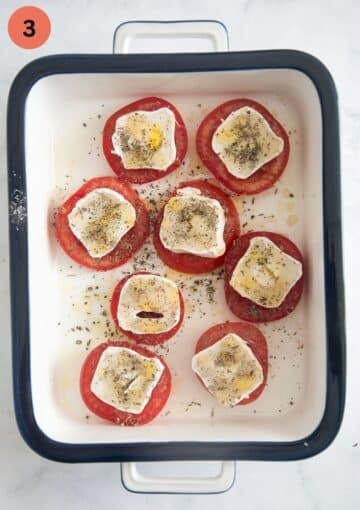 slices of tomato topped with slices of goat cheese and drizzled with honey and oil.