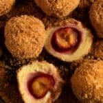 pinterest image with the title romanian plum dumplings.