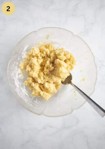 making potato and flour dough for plum dumplings.