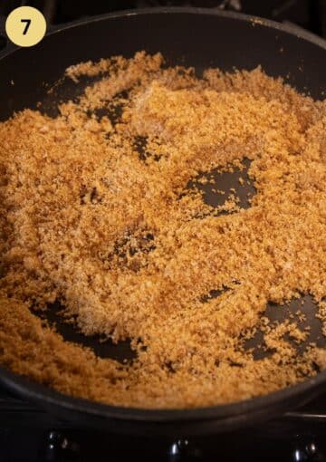 roasting breadcrumbs for coating dumplings in a large nonstick pan.