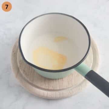 warm milk, melted butter, and spice mixture for mashed potatoes in a small saucepan.