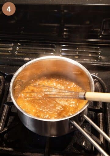 whisking sauce for turkey breast in a small pan.