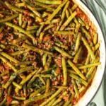 pinterest image with the title beef and green bean ragu.