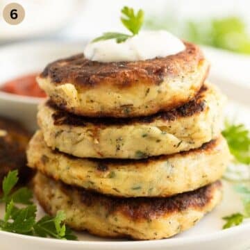 freshly fried leftover mashed potato cakes stapled on a plate.