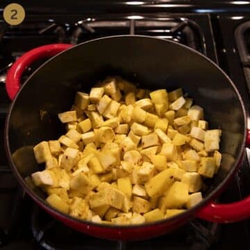 parsnip and potato cubes in a pot for making soup.