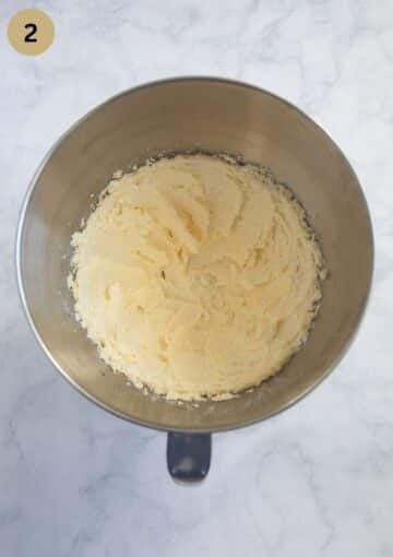 fluffy mixture of sugar and butter in a bowl for making cake batter.