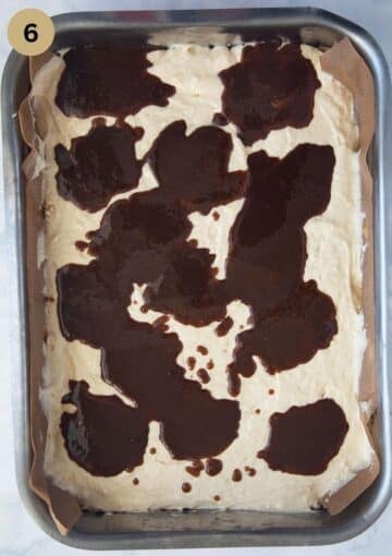 dollops of cinnamon topping on cake batter before swirling and baking.