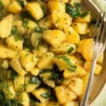 pin image with the title green onion potatoes.