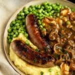 pinterest image with the title irish bangers and mash.