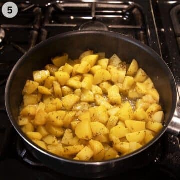 potato cubes smothered in vegetable stock with dried herbs.