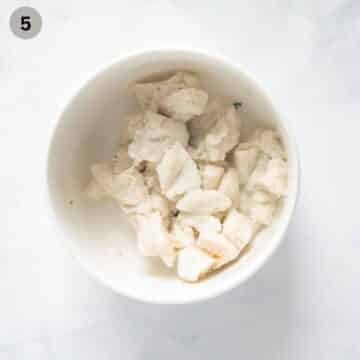 white bread pieces soaking in milk.