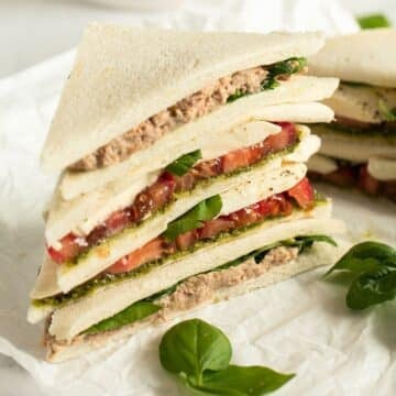 tramezzini recipe with two fillings: tuna and mozzarella and tomatoes.