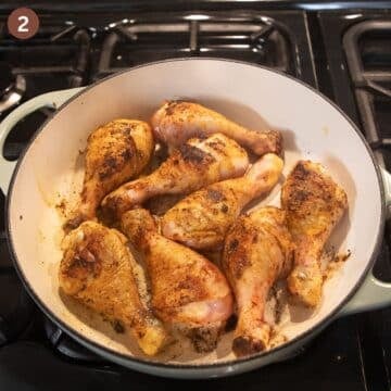 searing drumsticks in a large dutch oven.