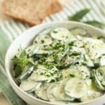 pinterest image with the title cucumber salad with yogurt.